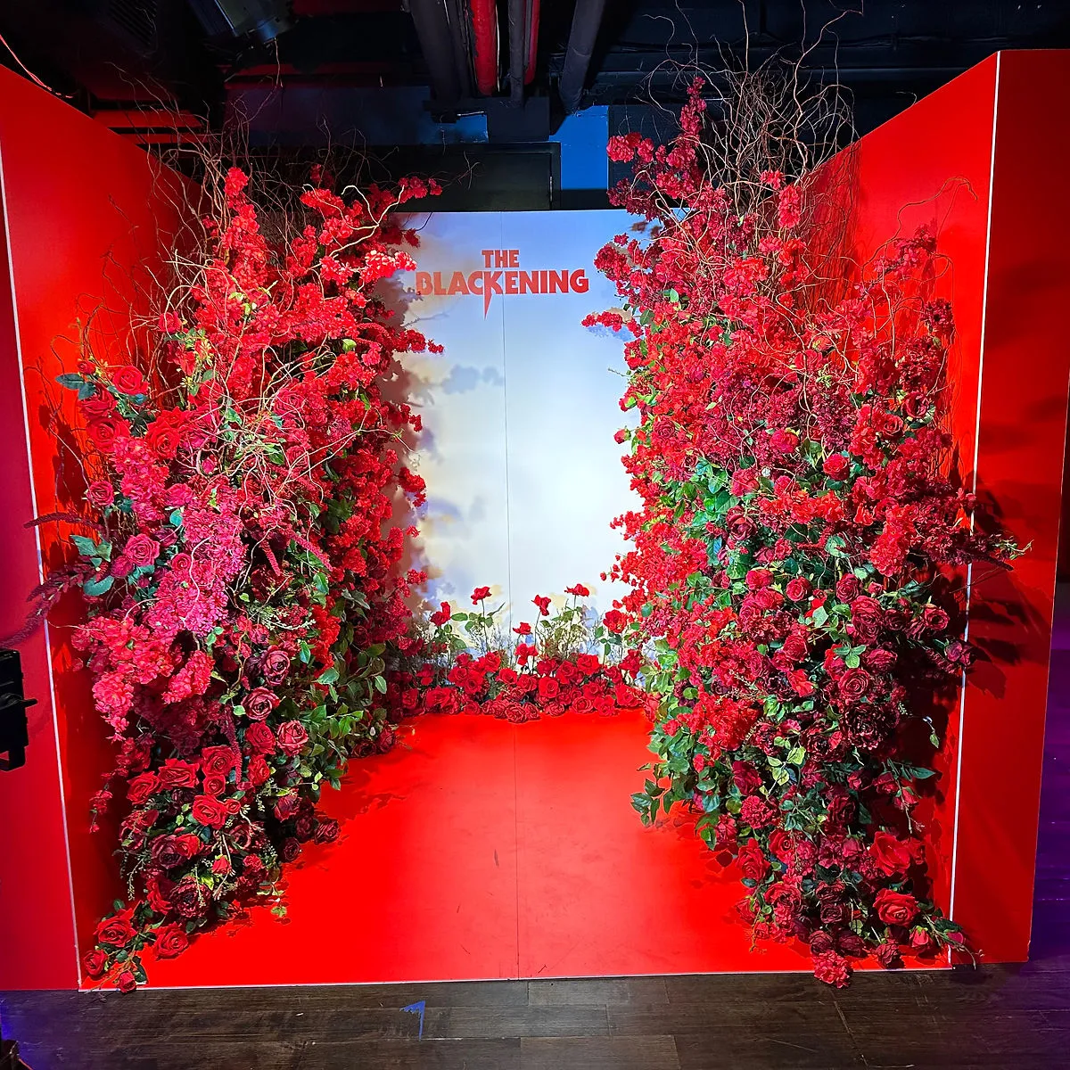 Corporate event flower wall installation