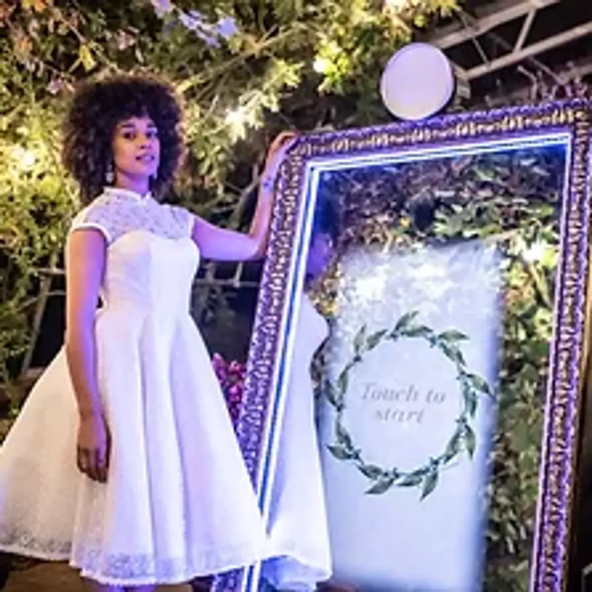 Guests using a photo booth at an NYC event